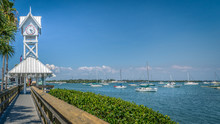 Small Boats Docked Next To The Historic Bradenton Beach Pier On Anna Maria Island In Florida.