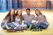 © Africa Studio - Group of teenagers at roller skating rink