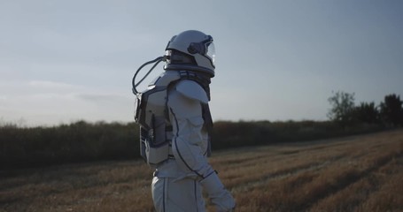 Wall Mural - Man in space suit walking