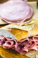 Wall Mural - Bread sandwich with bologna. Typical Brazilian sandwich found in the municipal market of the city of São Paulo.