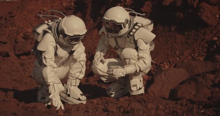 Wall Mural - Astronauts collecting rock samples on Mars