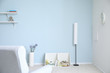 © Pixel-Shot - Modern Minimalist Room Interior with Light Blue Wall