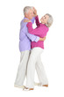 © aletia2011 - portrait of happy senior couple dancing on white background