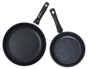 Empty black frying pan isolated on white background. Set of two pans.