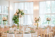 © miladrumeva - Luxury wedding table decoration. Special event table set up. Fresh flower decoration.