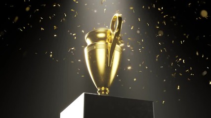 golden metallic trophy cup on the platform. award for a winner. falling confetti