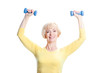 © luengo_ua - aged woman exercising with dumbbells