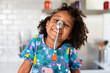 © Lisa Tichané - Portrait of funny young girl with spoon on her nose