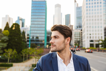 Wall Mural - Handsome young businessman smartly dressed