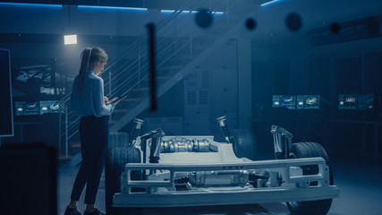 Poster - Automobile Engineer Working on Electric Car Chassis Platform, Using Tablet Computer Augmented Reality with 3D CAD Software Modelling. Innovative Facility: Vehicle Frame with Wheels, Engine, Battery