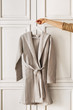 © LUMINA IMAGES - A Woman Holding Bathrobe