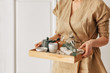 © LUMINA IMAGES - Spa Therapist Holding Tea Tray