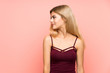 © luismolinero - Teenager girl over isolated pink background looking to the side