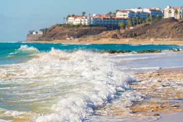 Canvas Print - Sea surf on a sandy beach Canary Islands