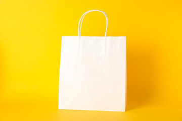 Poster - Paper bag on color background, space for text