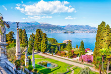 Beautiful Isola Bella Island With Flower Garden On Lake Lago Maggiore In The Background Of The Alps Mountains, Stresa, Italy