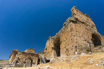 Wall Mural - Hierapolis Ancent City ruins in Pamukkale, Denizli, Turkey. Roman theater exterior view.