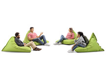 Young People Sitting On Bean Bags And Having A Conversation