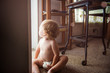 © Cavan for Adobe - Portrait of baby girl in domestic room