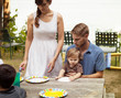 © Cavan for Adobe - Parents with baby boy (12-17 months) camping