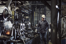 Mature Man Working In Factory