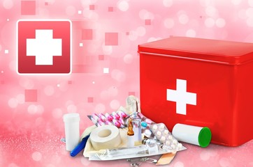 Poster - First aid kit  with medical supplies on background