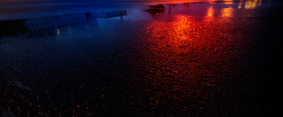 Wall Mural - Background of wet asphalt with neon light. Blurred background, night lights, reflection. Night city, dark street.