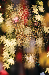 Wall Mural - colorful firework and bokeh with copy space for merry christmas and new year celebration background