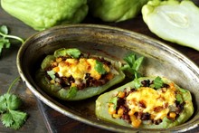 Chayote Stuffed Baked Stuffed With Minced Meat, Corn And Pieces Of The Chayot With Cheese Sauce