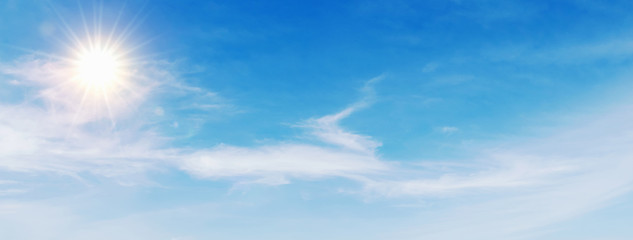 Wall Mural - blue sky with white cloud and sun