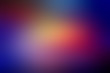Abstract Blurred Gradient Background in Dark Key. Blue, Violet, Yellow, Red Colors.