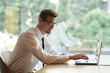 © SHOTPRIME STUDIO - businessman working on his laptop in park