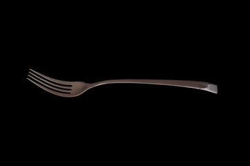 Empty Steel Fork isolated on black background