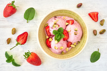 Poster - Strawberry ice cream , frozen yogurt with fresh strawberries and mint leaves. Top view