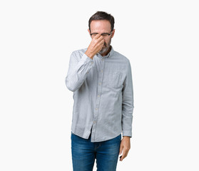 Sticker - Handsome middle age elegant senior man wearing glasses over isolated background tired rubbing nose and eyes feeling fatigue and headache. Stress and frustration concept.