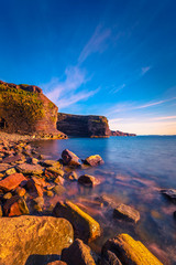 Wall Mural - View of a beach at Bell Island, Newfoundland, Canada during sunset