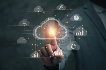 Leinwandbilder - Big data analytics and business intelligence concept with chart and graph icons on a digital screen interface and a businessman in background
