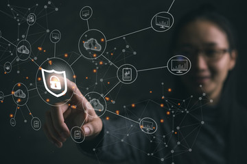 Aufkleber - Businesswoman pressing shield protect icon on virtual screen, Concept cyber security safe your data.