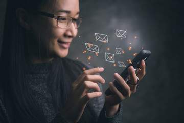 Poster - woman sending e-mail message to mailing list contacts using smartphone,
