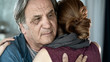 © sebra - Father and daughter hugging close up view