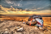 Sunset With Rock And Graffiti Rock