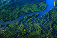 River In Tropic Costa Rica, Corcovado NP. Lakes And Rivers, View From Airplane. Green Grass In Central America. Trees With Water In Rainy Season. Photo From Air.