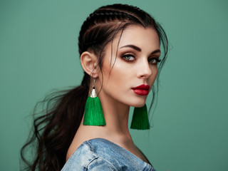 brunette girl with perfect makeup. beautiful model woman with curly hairstyle. care and beauty hair 
