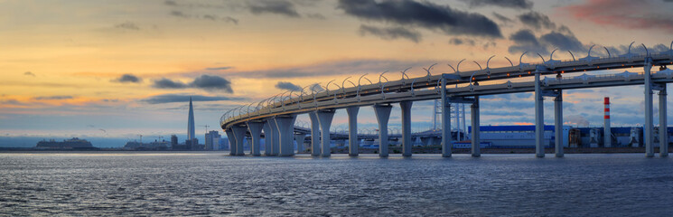 Wall Mural - Panorama of the Western high-Speed Diameter in St. Petersburg at sunset