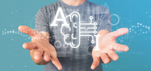 Poster - business man holding artificial intelligence icon with half brain and half circuit 3d rendering