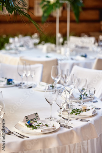 Table Setting With Blank Guest Card On Empty White Plate And