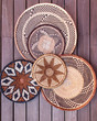 African grass baskets on a wooden background 