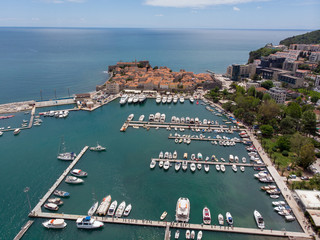 Wall Mural - Old Town Budva. Aerial view to Dukley Marina from sky.