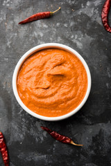 Canvas Print - Peri Peri Sauce in a bowl, originally from portugal, it's a hot sauce made using piri piri or African bird's eye chillies.  selective focus