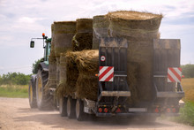 Agricultural Old Machinery Transporting Dry Hay Bales.